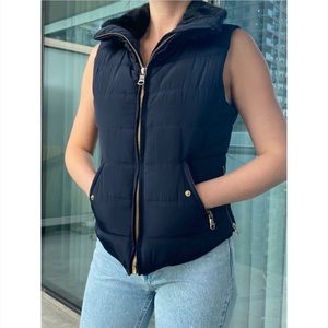 Dark blue vest with gold details